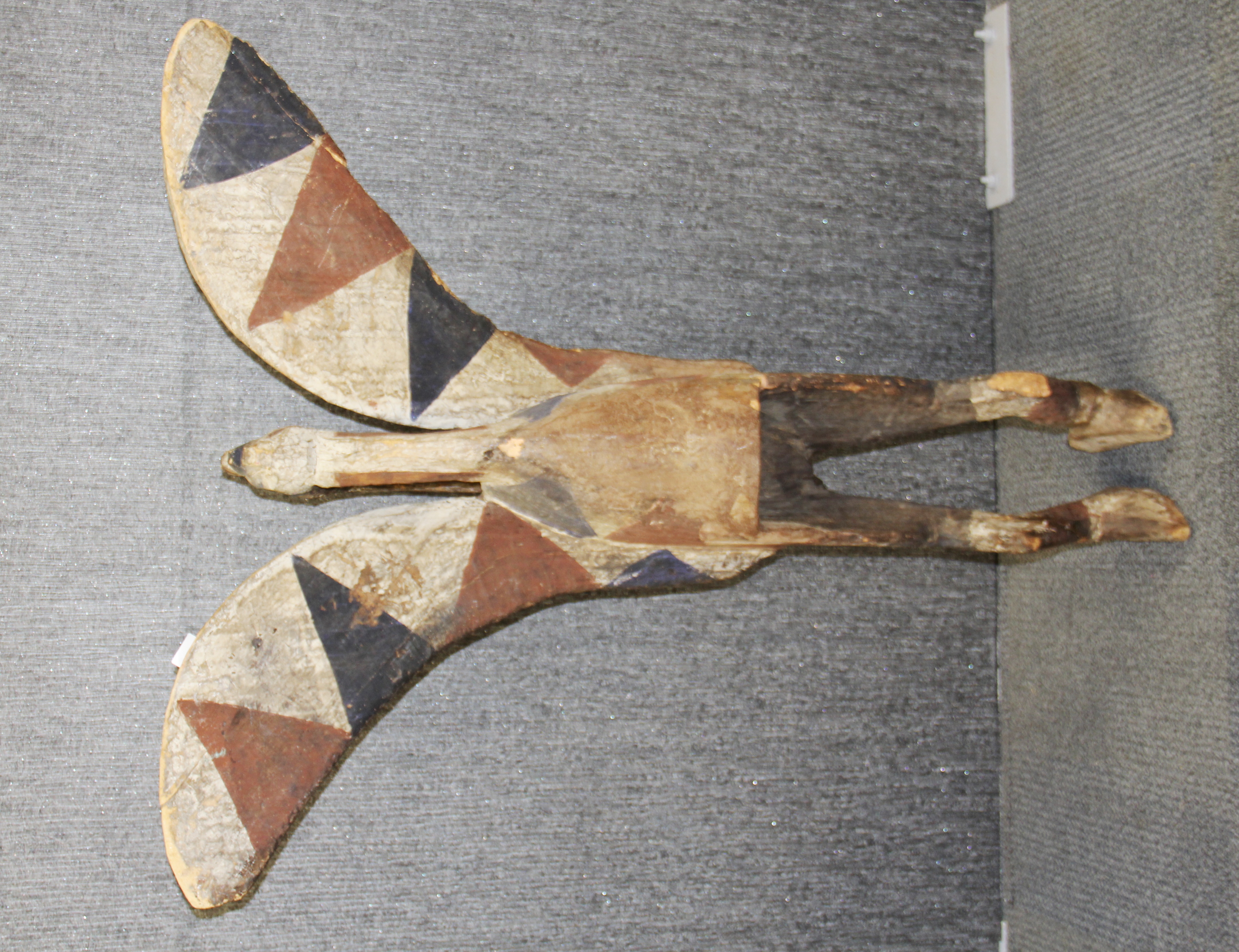 A superb large antique African wooden hornbill headdress decorated with blue and red pigment, - Image 2 of 4
