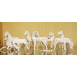 A group of eight Chinese Blanc de Chine porcelain horses, H. 8cm.