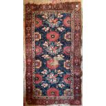 An early hand woven Eastern rug, 94 x 157cm.