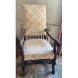 A 19th century carved oak upholstered armchair,