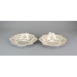 A pair of hallmarked silver pierced dishes, W. 19cm.