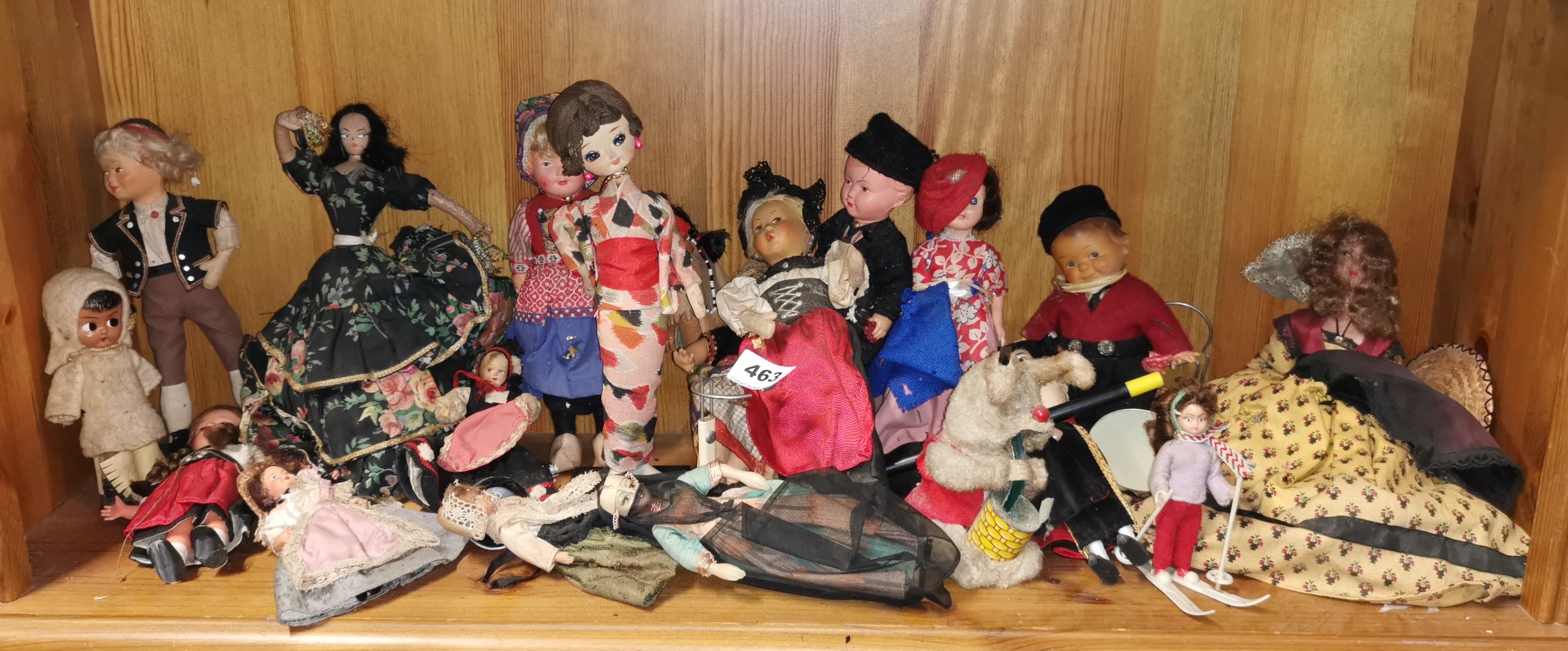 A collection of vintage dolls and toys.