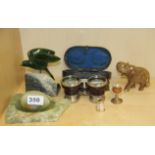 A pair of 19th century opera glasses, a Canadian jade bird figure and other items.