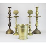 A pair of large brass candlesticks, H. 48cm. Together with a pair of Persian style oil lamps and