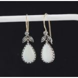 A pair of opal and diamond drop earrings with 9ct yellow gold fittings set in silver, L. 2cm.