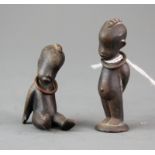 Two small cast bronze figures of African children, H. 6cm.