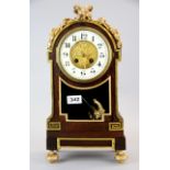 A 19th century French mahogany veneered and ormolu mounted mantle clock, H. 41cm.