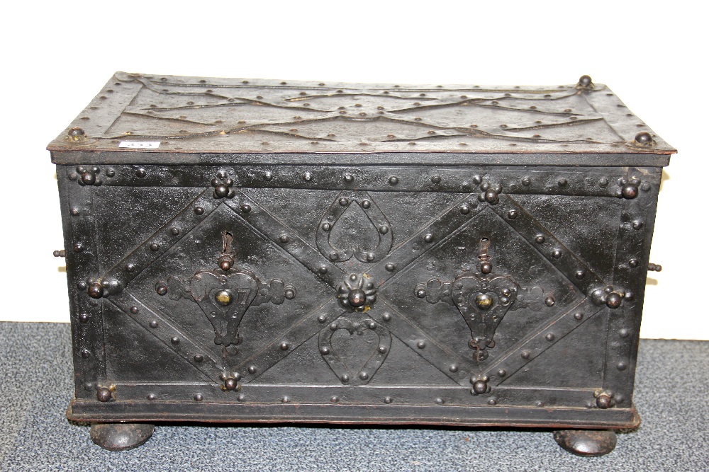 A superb 18th/early 19th century iron trunk with impressive double locking system, 62 x 34 x 37cm.