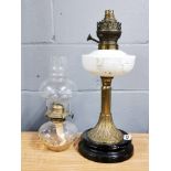 A Victorian oil lamp base converted for electricity and further oil lamp, tallest H. 41cm.
