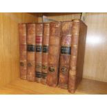 Seven volumes of Parliamentary debates circa 1802, leatherbound.