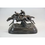 A cast bronze horseracing group figure on a marble base, H. 26cm, W. 42cm.