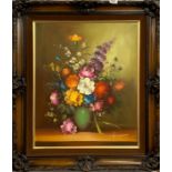 A signed framed oil on canvas still life, frame 70 x 80cm.