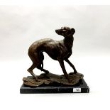 A large bronze figure of a greyhound after J. B. Mene on a black marble base, H. 32cm.