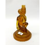 A 1920's amber glass table lamp base, H. 23cm.