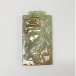 A Chinese carved celadon green nephrite jade panel of a crane, 9 x 4.5cm.