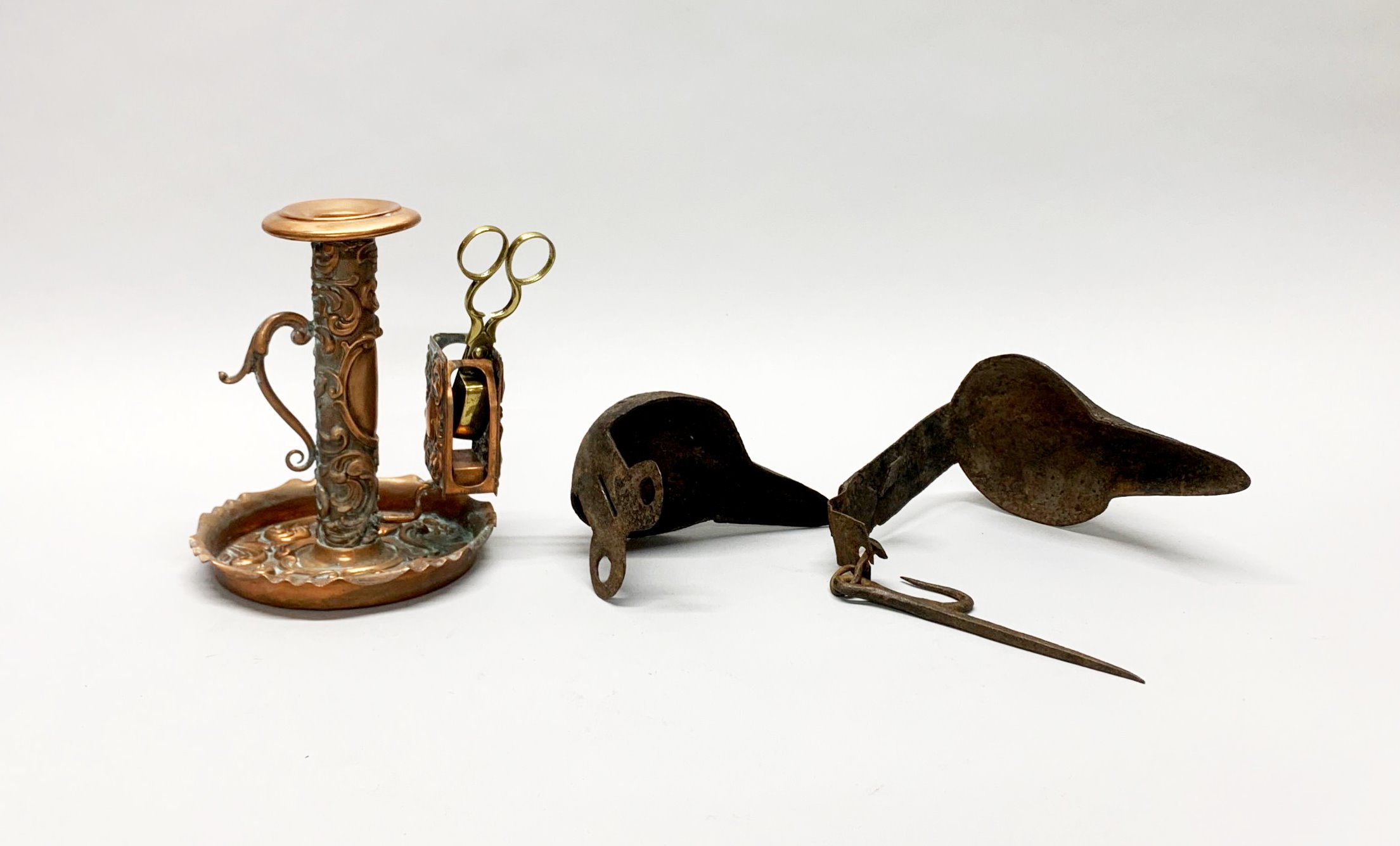 A group of mixed brass, pewter, copper and iron candlesticks, lamps and spout lamps etc tallest H. - Image 4 of 4