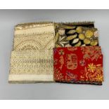 Four vintage Indian embroidered cloths and shawls in a vintage Harvey Nichols box dated 1936.