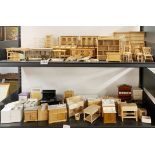 A large quantity of dolls house wooden furniture.