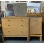 A 1960's satinwood veneered dressing table and bedside cabinet, dressing table W. 75cm H. 118cm.