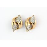 A pair of yellow gold (tested minimum 9ct gold) diamond set stud earrings, L. 2.1cm.