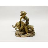 An early 19th century French gilt cast iron figure of a child with a hunting hound, impressed Jeche,