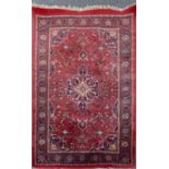 A large heavy quality Persian style wool rug, 192 x 295cm.