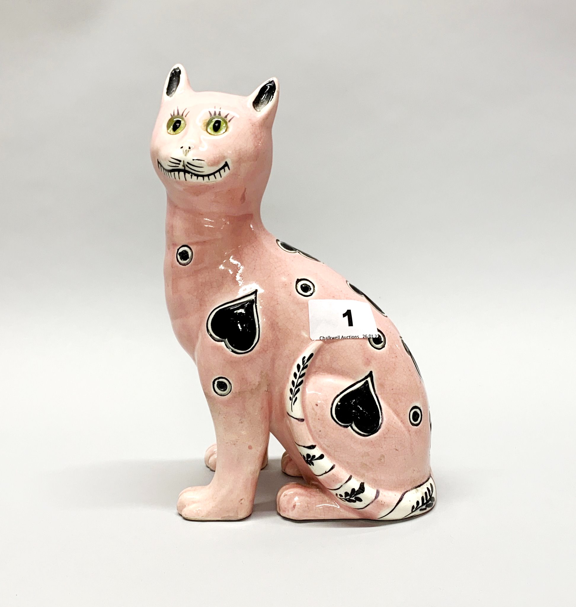 A continental Galle type porcelain figure of a cat with glass eyes, H. 24cm.