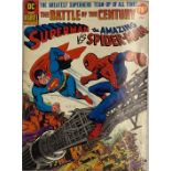 A copy of 'The Battle of the century' Superman vs Spiderman, DC and Marvel comics.