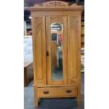 An Art Nouveau carved satinwood wardrobe, 98 x 205cm.