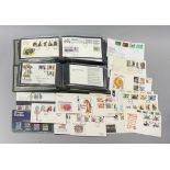 Two albums of First Day covers and other stamps.