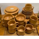 An extensive Denby style pottery tea, soup and dinner set.