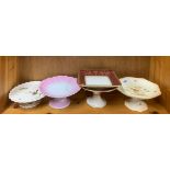 A group of porcelain cake stands.