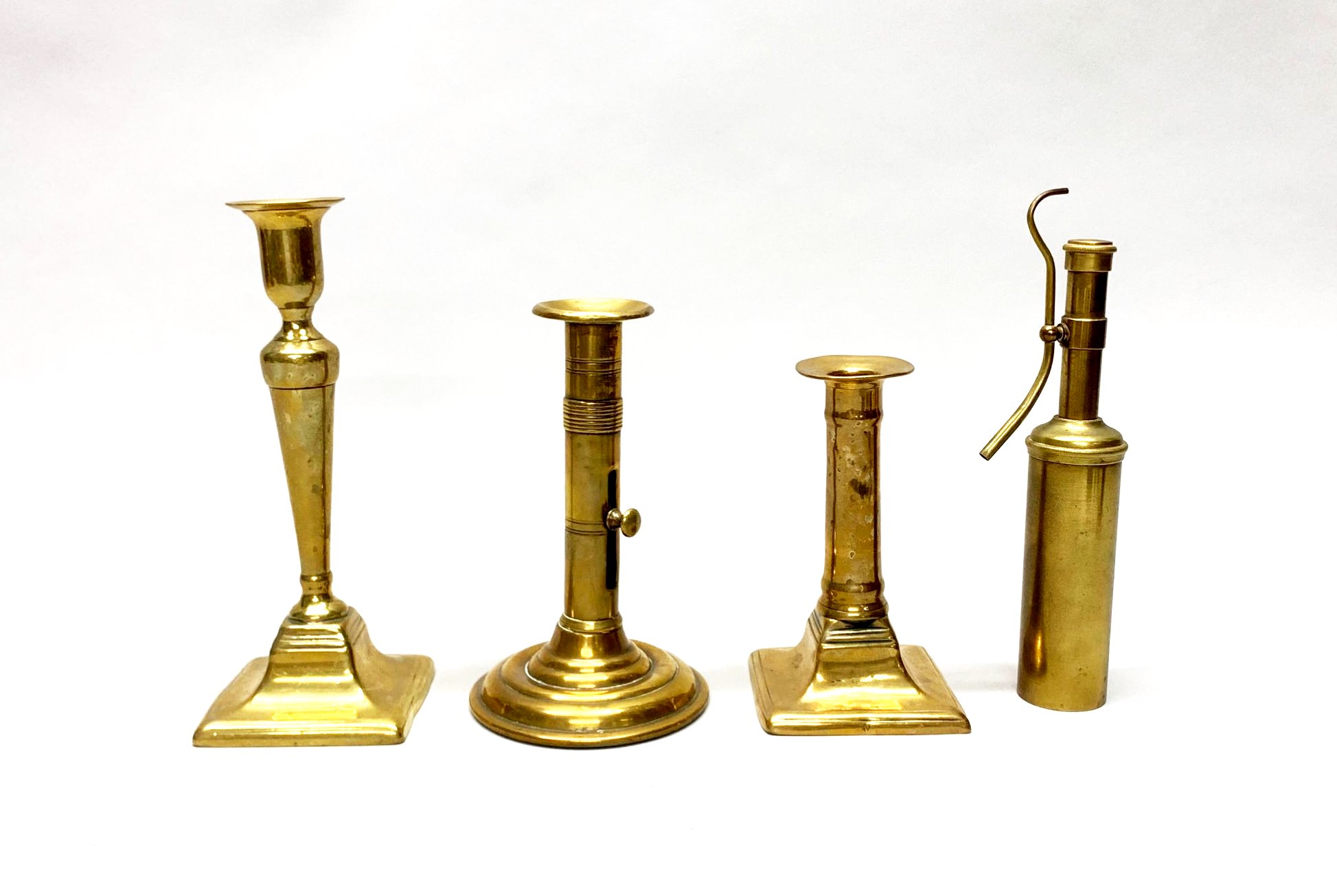 A group of mixed brass, pewter, copper and iron candlesticks, lamps and spout lamps etc tallest H. - Image 3 of 4