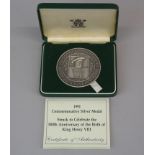 A boxed heavy 1991 commemorative silver medal celebrating the 500th anniversary of the birth of King