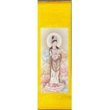 A Chinese silk mounted scroll of the goddess Guanyin, 50 x 145cm.