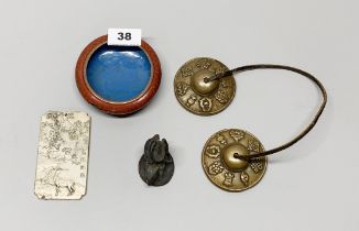 A pair of Tibetan bronze tingshaw bells with a Chinese white metal weight, a cloisonne enamelled