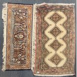 A hand woven Hamedan rug, 78 x 134cm together with an Eastern silk rug, 46 x 118cm.
