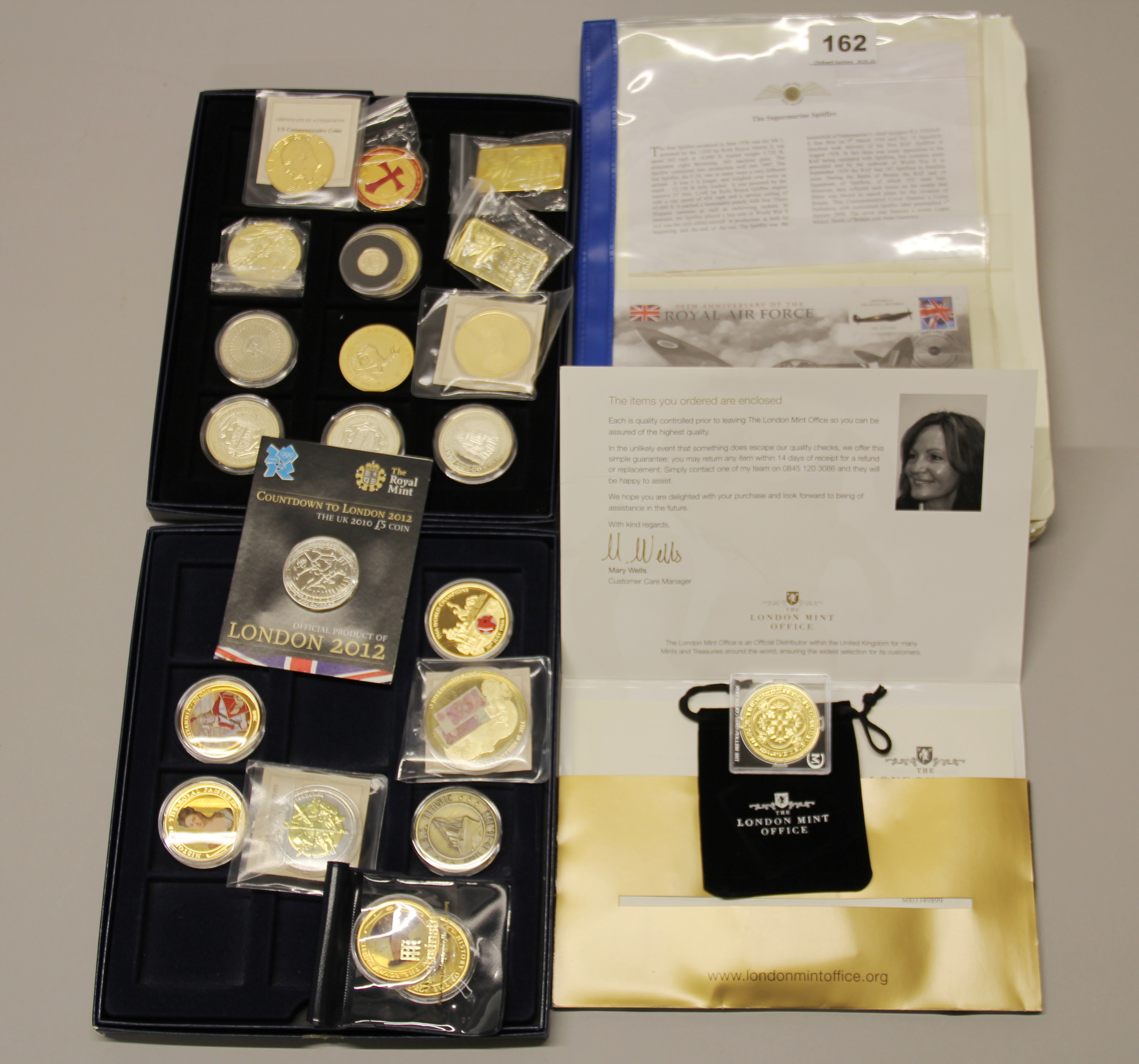 A group of first day cover coins and mixed commemorative and copy coins.