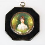 A framed hand painted portrait miniature on porcelain, 10 x 10cm.