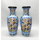 A pair of large mid 20th century Chinese porcelain vases decorated with birds and flowers, H. 60cm.