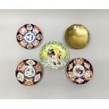 Three Japanese Imari plates, Dia. 22cm. Together with a Japanese hand enamelled plate, an engraved