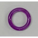 A Chinese lavender jade bangle, Dia. 1.5cm internal Dia. 6cm.