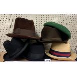 A group of vintage gentlemen's hats.