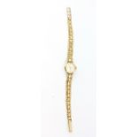 A boxed lady's Accurist 9ct yellow gold wrist watch,