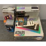 A vintage Atari 800 XL computer with program recorder etc.