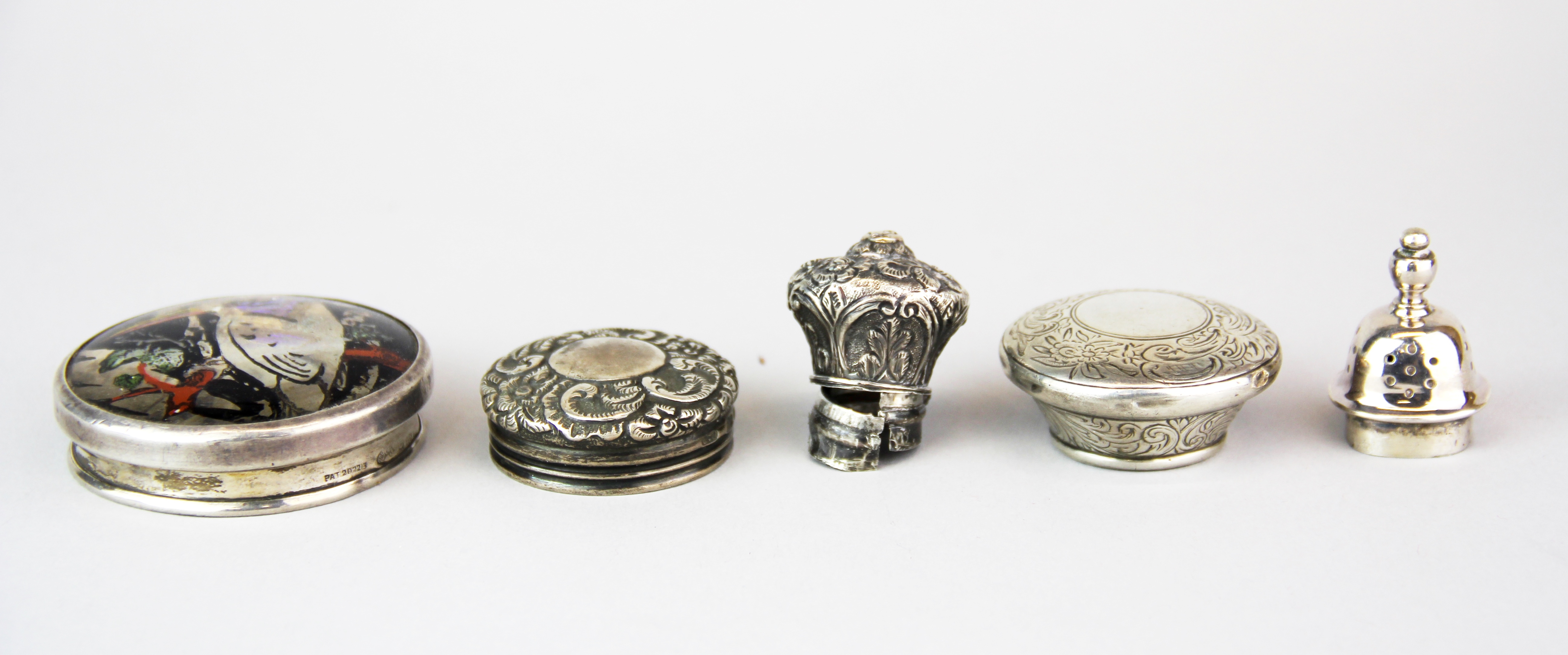 A group of useful hallmarked silver lids.
