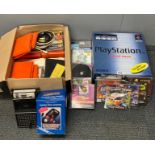 A Sony PlayStation and games.
