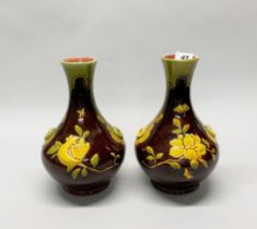 A pair of early 20th century Bretby glazed pottery vases, H. 28cm.