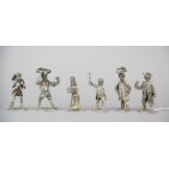 A group of six small hallmarked silver figures of street traders, H. 6cm.