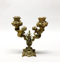 A 19th century bronze/brass cherub candelabrum, H. 20cm.